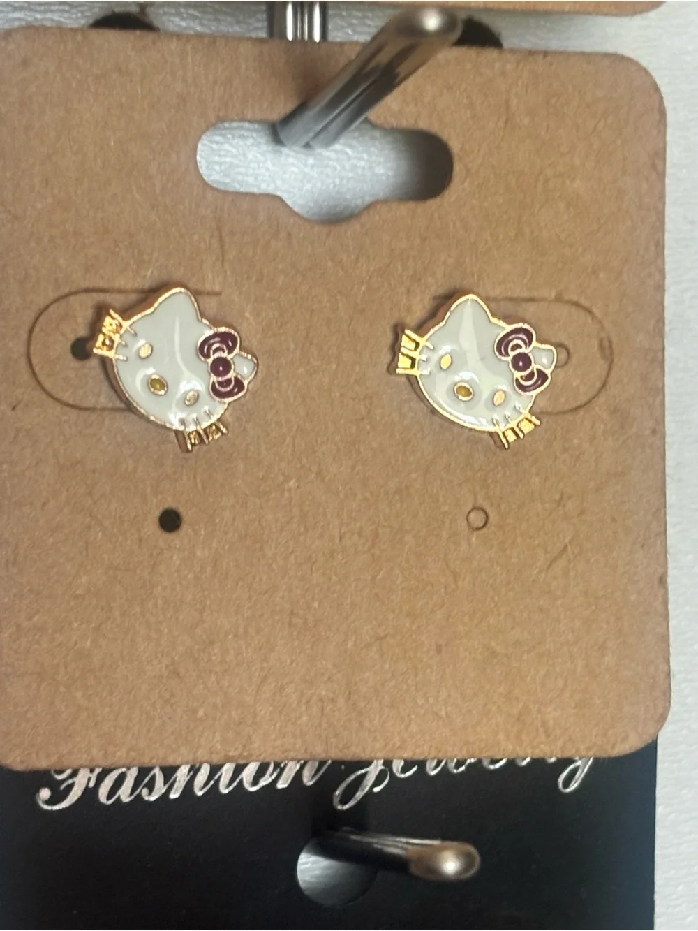 Gold-Tone White Cat Face Stud Earrings with Purple Bow